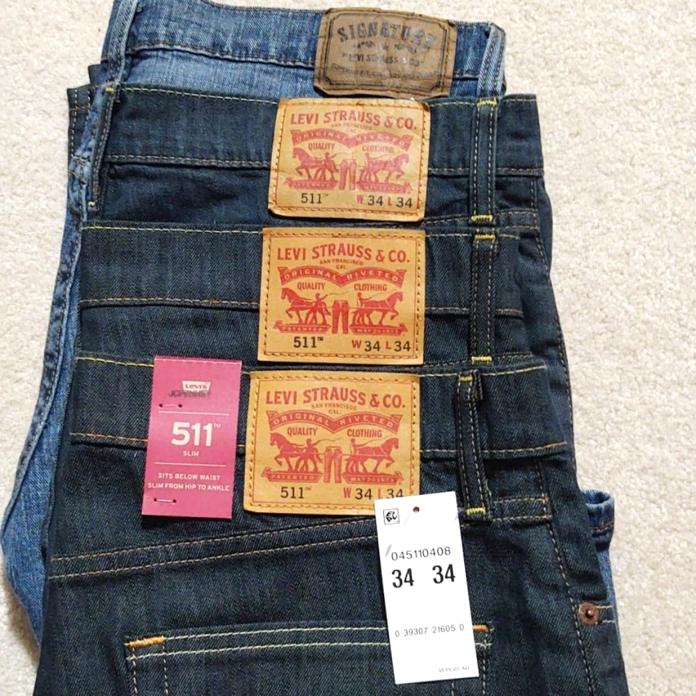 4 pairs of Levi's slim fit jeans, size 34x34
